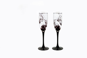 glass black wine white background close up fougere paint smoke streak two