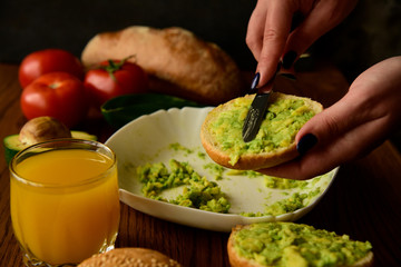 Making avocado toast on the home kitchen