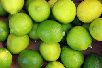 fresh lemons and limes in market