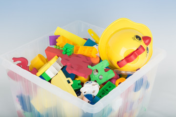 Plastic container with toys for kids