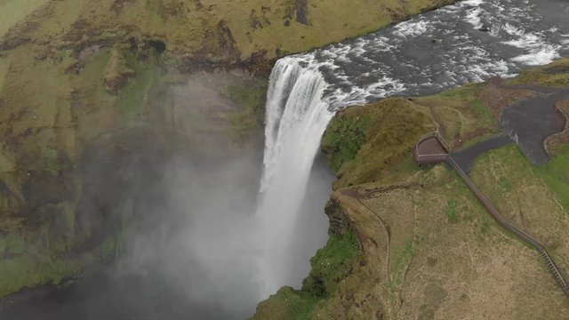 Aerial flight with drone over the famous waterfall in Iceland.