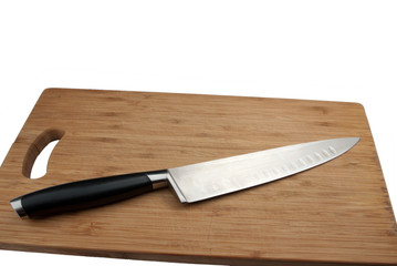 knife for meat and cutting board