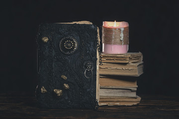 Book of magic on the magician table. Witchcraft.