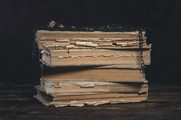 Stack of magic literature on the magician table. Witchcraft.
