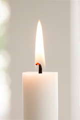 Burning candle light close up