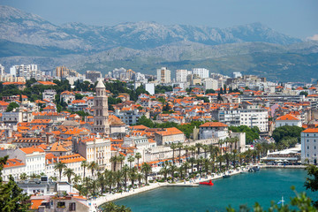 Fototapeta na wymiar Old town of Split in Dalmatia, Croatia. Panoramic view of city center, palace of Roman emperor Diocletianus and cathedral. Popular tourist destination in Europe.