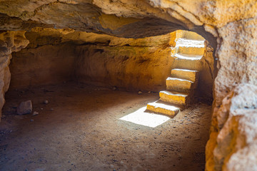 Cyprus Republic. Pathos. Tombs of the Kings. Paphos Royal ancient cemetery. Ancient catacomb crypt. Paphos archaeological site. Touristic sightseeing in Cyprus. Travel to Cyprus.