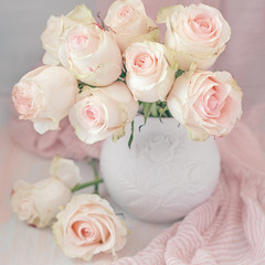 Close-up floral composition with a pink roses .Many beautiful fresh pink roses on a table.