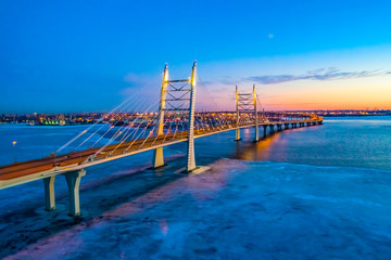 Saint-Petersburg. Russia. Cable-stayed bridge over the ship's fairway winter.  Bridge in the Neva Bay. Western high-speed diameter. Evening Neva. Petersburg bridges. Russian cities. Petersburg roads.