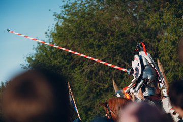 Knight with lancer on horse on knight tournament