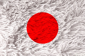 beautiful national flag of japan on soft fur with soft folds, close-up