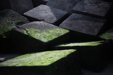 Big stoned cubes on the seaside 