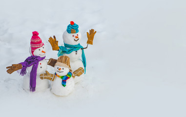 Merry Christmas and happy new year greeting card with copy-space. Happy smiling family snowman -...
