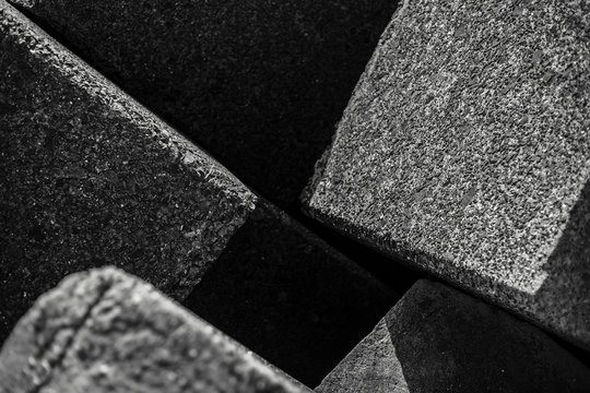 Black and white abstract background of stone square © Lalandrew