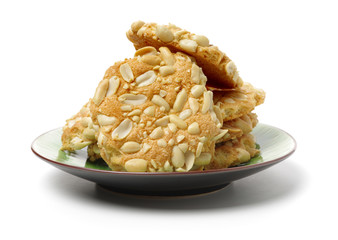 Cookies with peanuts on white background