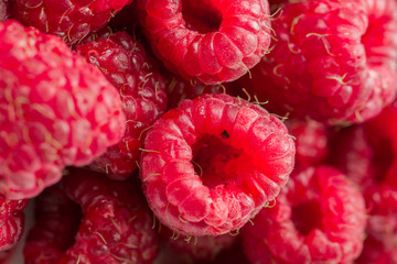 Fresh and sweet raspberries background