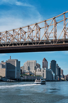 Upper East Side Manhattan and Ed Koch Queensboro Bridge on sunny day
