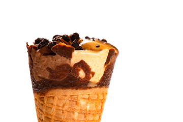 fresh coffee flavor ice cream cone with chocolate on white background close up with copy space