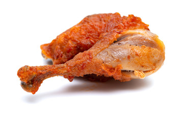 side view fresh fried chicken leg on white backgorund