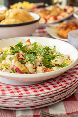 Bowl of Ceviche and other party celebration foods on a table