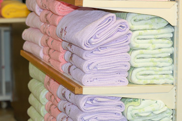 Stack of multicolored bath towels