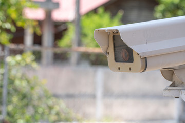 CCTV camera or outdoor security cameras on a wall, video protection safety system guard