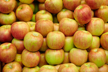 Piled up apples at fruit shop