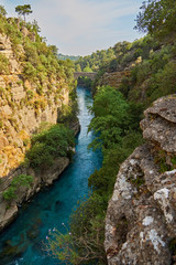Fototapeta na wymiar wonderful landscape with mountain river, canyon and bridge