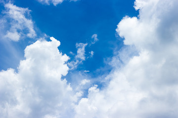 Naklejka na ściany i meble Blue sky with clouds background.