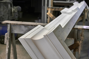 Crown molding of a classic wardrobe. Production of wood furniture. Furniture manufacture. Close-up