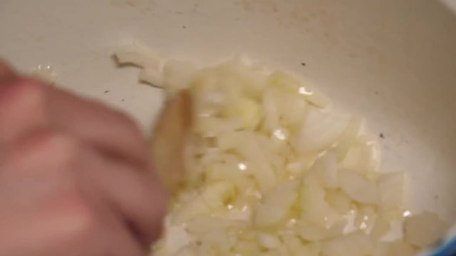 Beef bourguignon, putting the meat on the fried onions