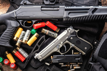 Weapons and military equipment. 9 mm pistol gun bullets and 12 gauge shotgun