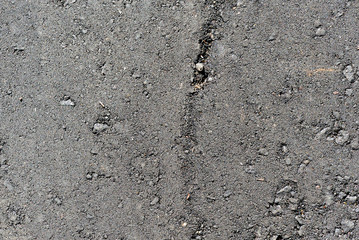New black asphalt texture close up. Abstract background