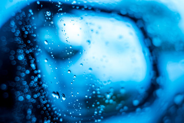 Rain drops on the windshield In the evening when heavy rain