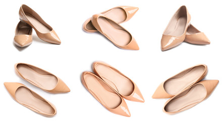Set of stylish female shoes on white background