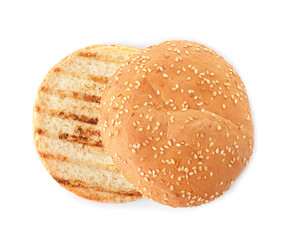 Grilled burger bun isolated on white, top view