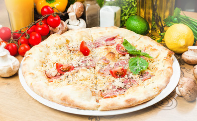 Delicious Pizza on Wooden Board close up
