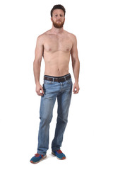 Fototapeta premium man shirtless and with blue jeans on white background