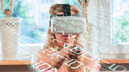 Teen using virtual reality headset, abstract shapes graphic algorithm