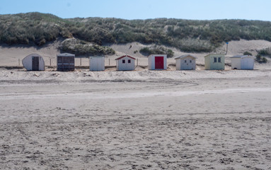 Fototapeta na wymiar Dutch coast. Netherlands. Beachhouses at the island of Texel