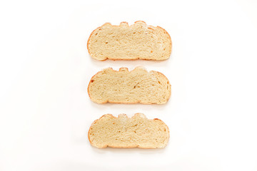 Set of three slices toast bread isolated on white background. Three fresh bread slices. Toasted bread. Space for your text. Bakery, food concept. 