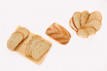 White bread and Sliced bread. Assortment of baked bread. Baked bread  isolated on white background, top view. Bakery, food concept. Top view with space for your text.