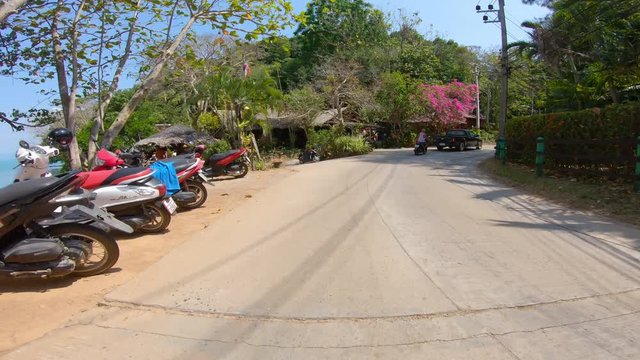 Riding a motorcycle on Thailand island. First person view (FPV)