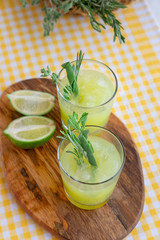 Fresh Cocktail With Rosemary And Melting Ice