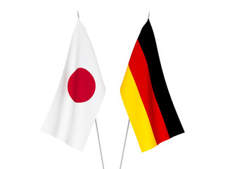 Obraz premium National fabric flags of Germany and Japan isolated on white background. 3d rendering illustration.