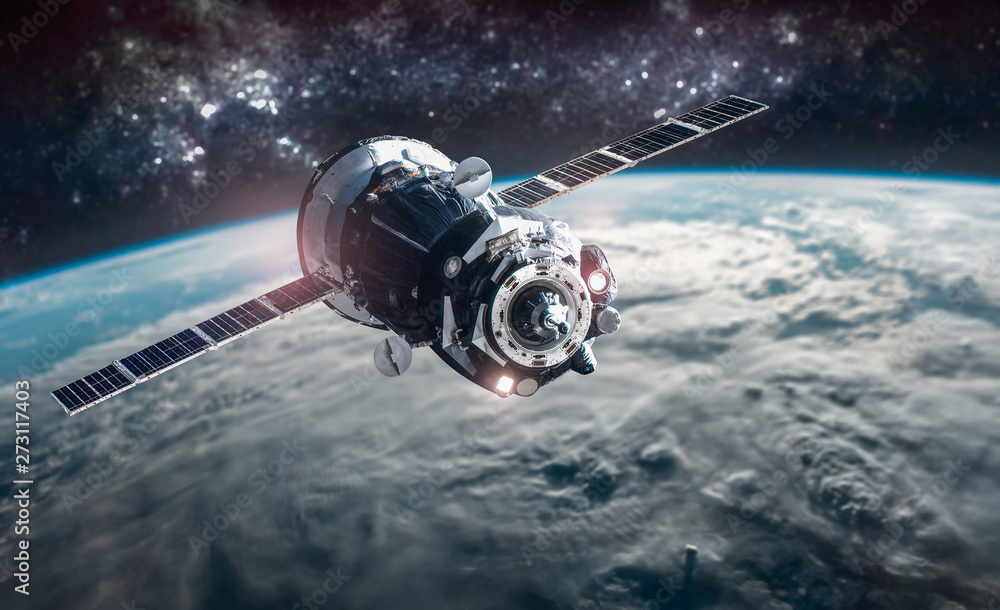 Aufkleber cargo space craft on orbit of the earth planet. milky way on background. elements of this image furn