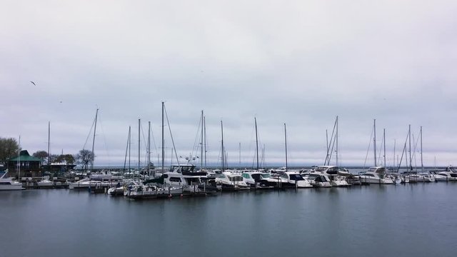 View of The Boats Docked At Lakefront McKinley Marina on Cloudy Morning