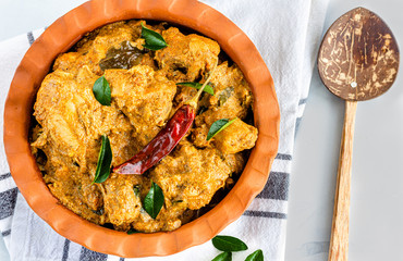 Chettinad Chicken Curry / Chicken Chettinad, Popular South Indian Chicken Curry Dish Made with Indian Spices and .Coconut, Garnished with Curry Leaves.