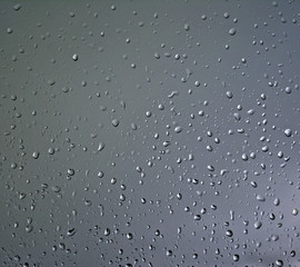 Drops of rain on glass