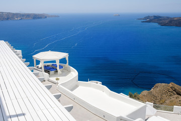 The sea view terrace at luxury hotel, Santorini island, Greece. Romantic vacation by the sea